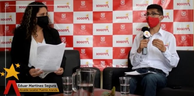 Alcalde Local Eduar Martínez y jefe de prensa Johana Santana